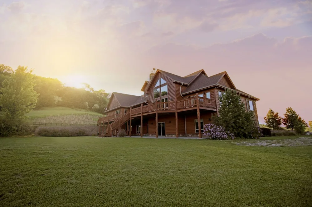 Illustrative house and landscaped lawn